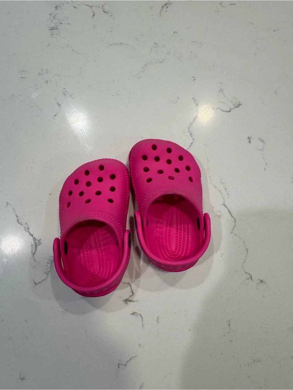 Pink toddler Crocs Classic Clogs in the 